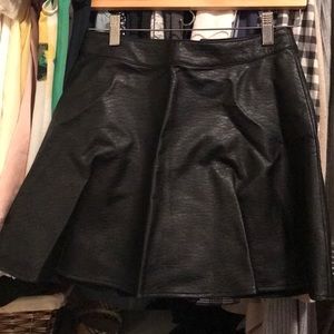 Black faux leather mini skirt